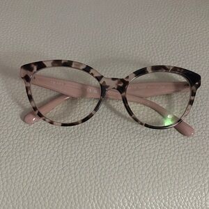 Prada Pink and Tortoise Shell Glasses
Excellent condition no wear, look new.